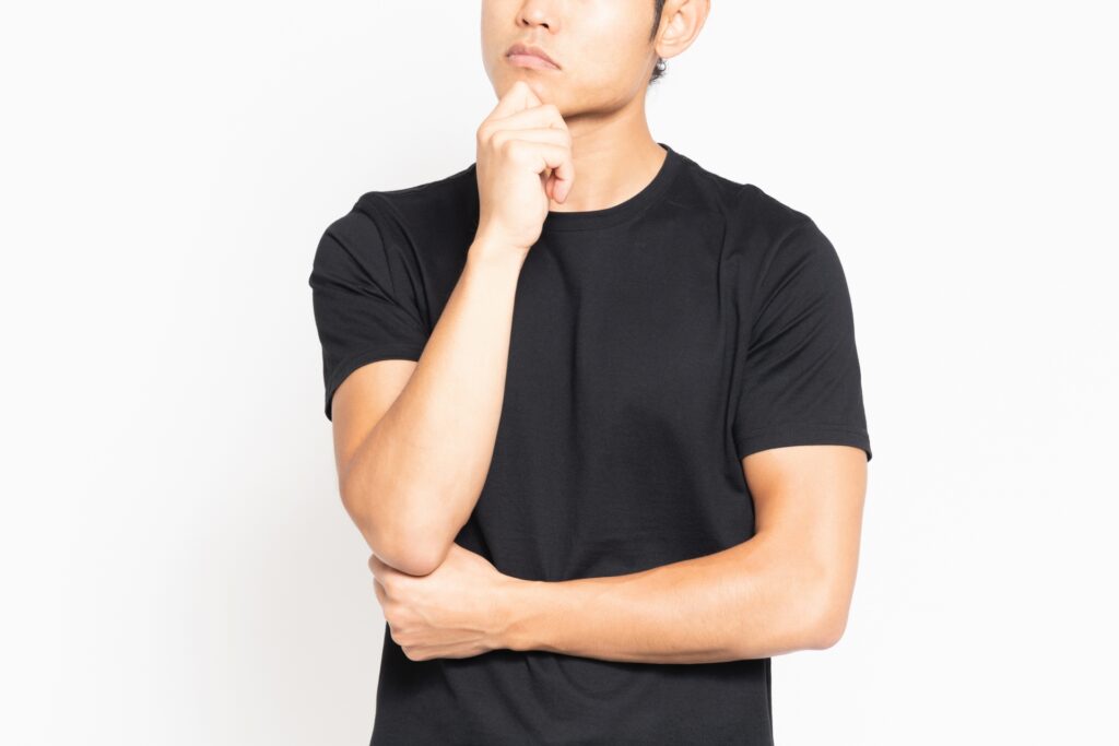 考える人